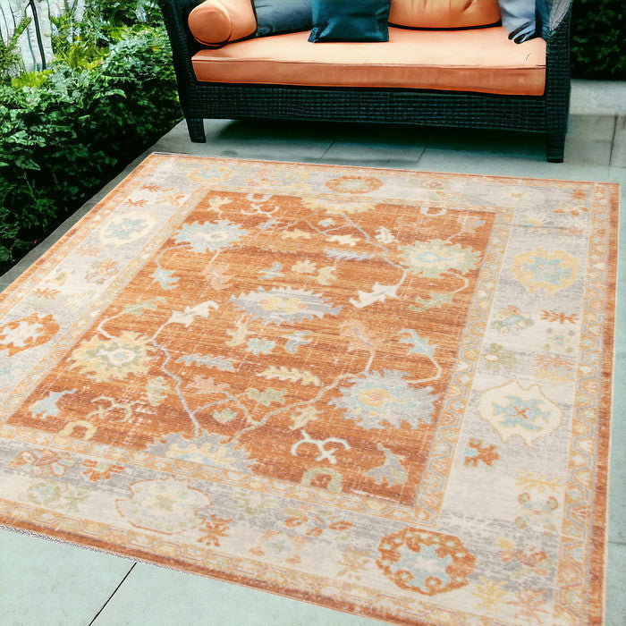 5' X 7' Blue and Orange Floral Stain Resistant Indoor Outdoor Area Rug