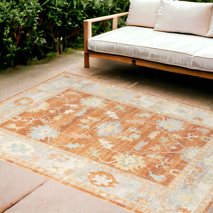 5' X 7' Blue and Orange Floral Stain Resistant Indoor Outdoor Area Rug