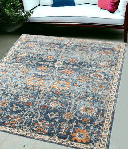 5' X 7' Blue and Orange Floral Stain Resistant Indoor Outdoor Area Rug