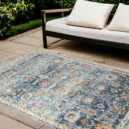 5' X 7' Blue and Orange Floral Stain Resistant Indoor Outdoor Area Rug