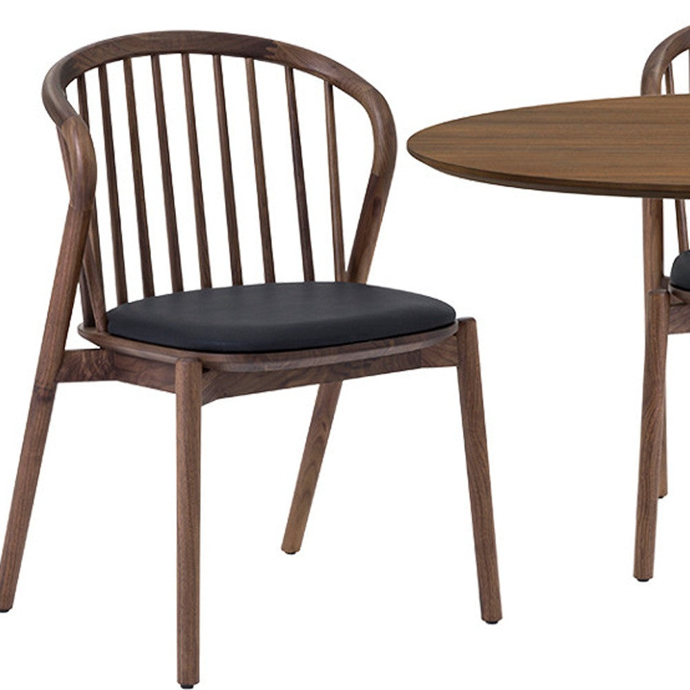 Five Piece Brown and Black Oval Dining Set with Four Chairs