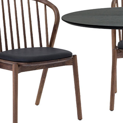 Six Piece Black Oval Dining Set with Four Chairs and Sideboard